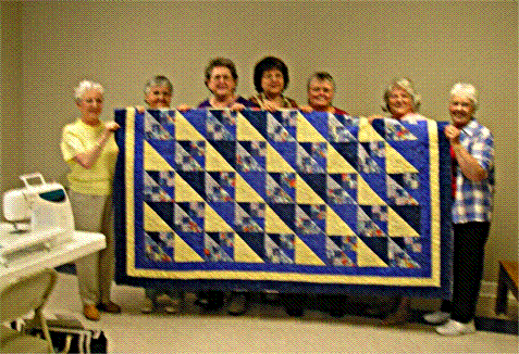 Quilting Ladies made this beautiful quilt for the Murals Society.